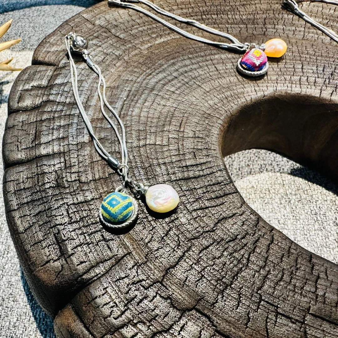 谭湘光 | 广西非遗手工壮锦珍珠链子