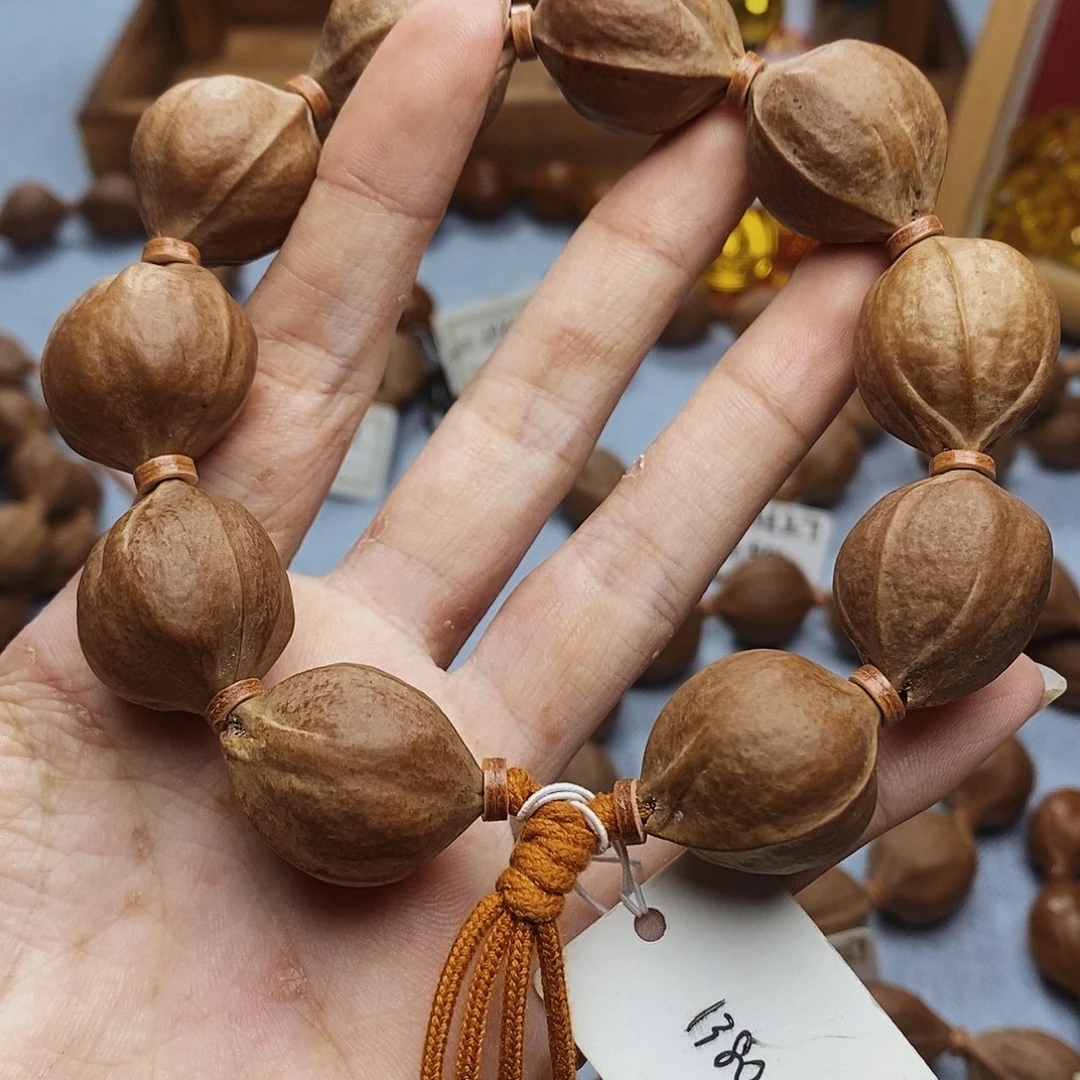 用***仁橄榄核手串梅林铁核2125