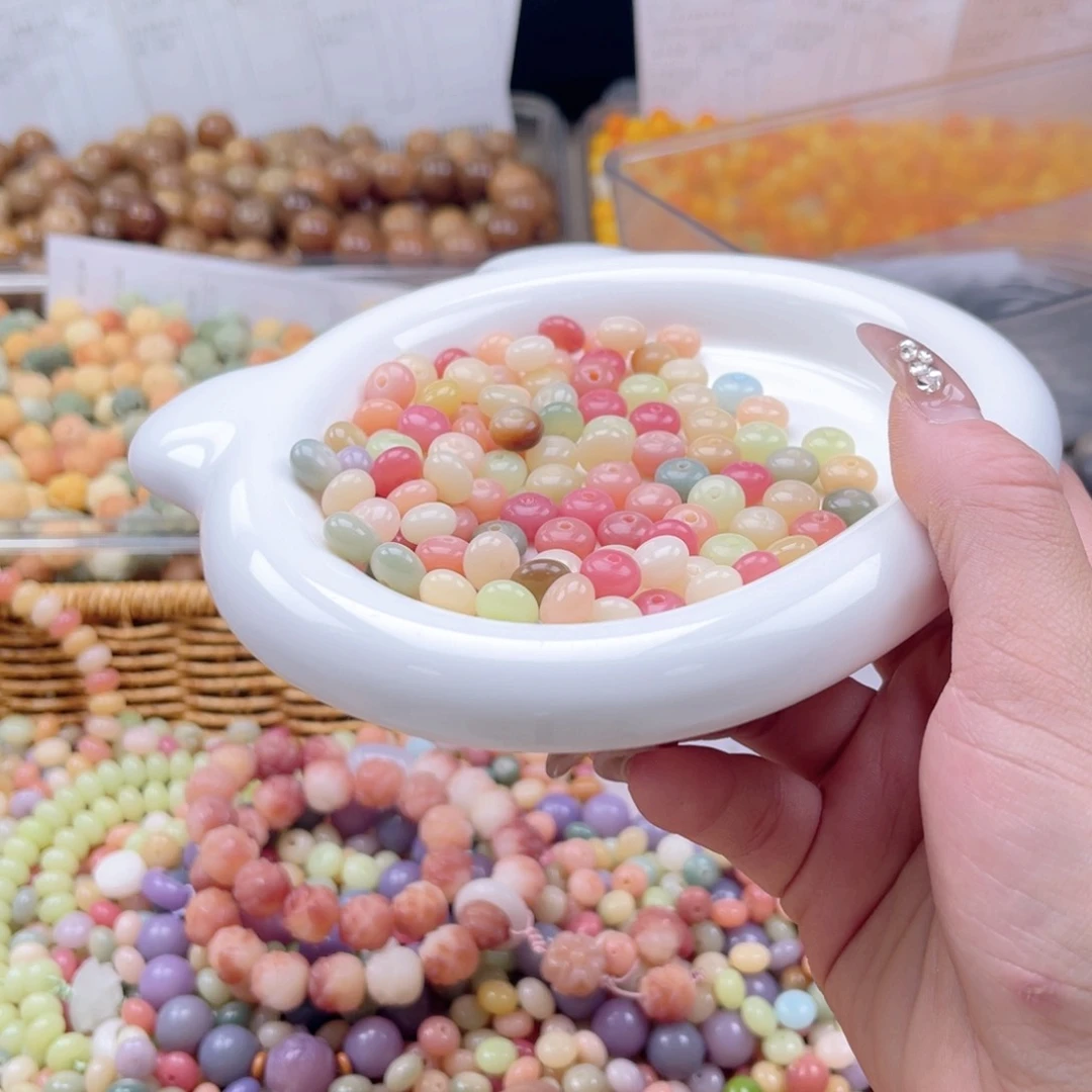 白玉菩提吊坠z9mm150颗。微瑕算盘