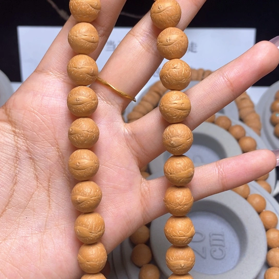 凤眼菩提吊坠手持