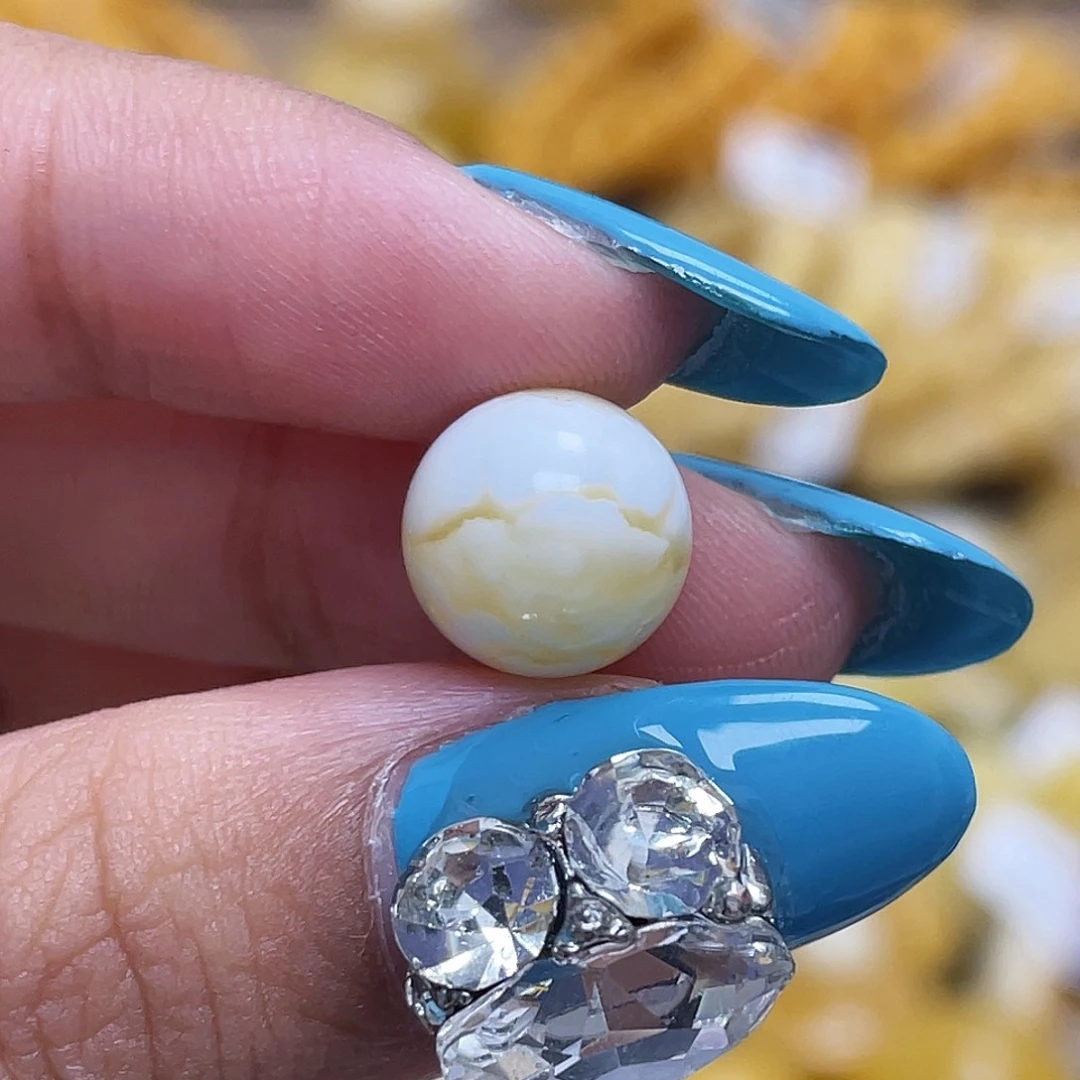 蜜蜡未镶嵌珠宝奇石小****?10.0mm金瓷白妖花圆珠