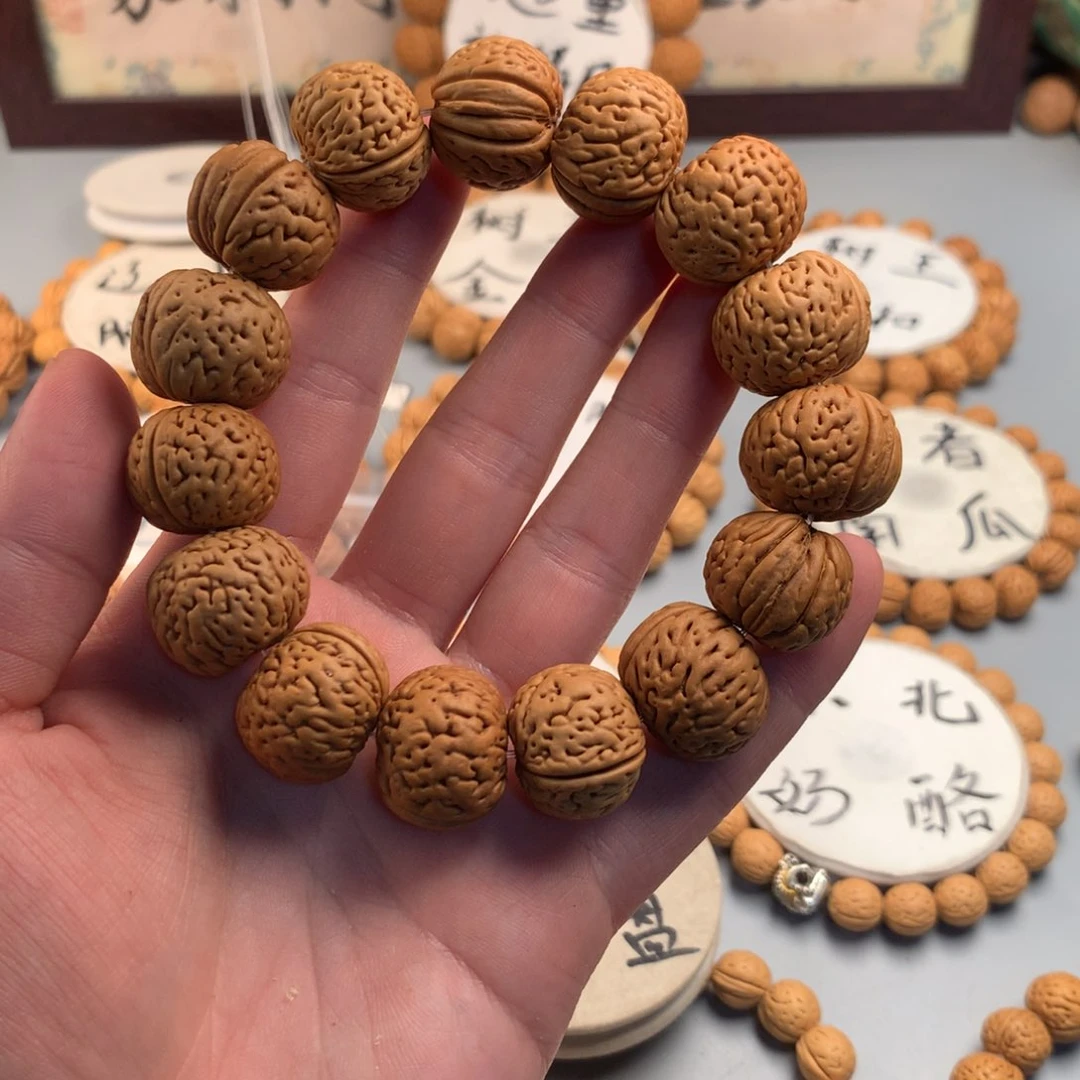 桃核手串生****息老树磨盘