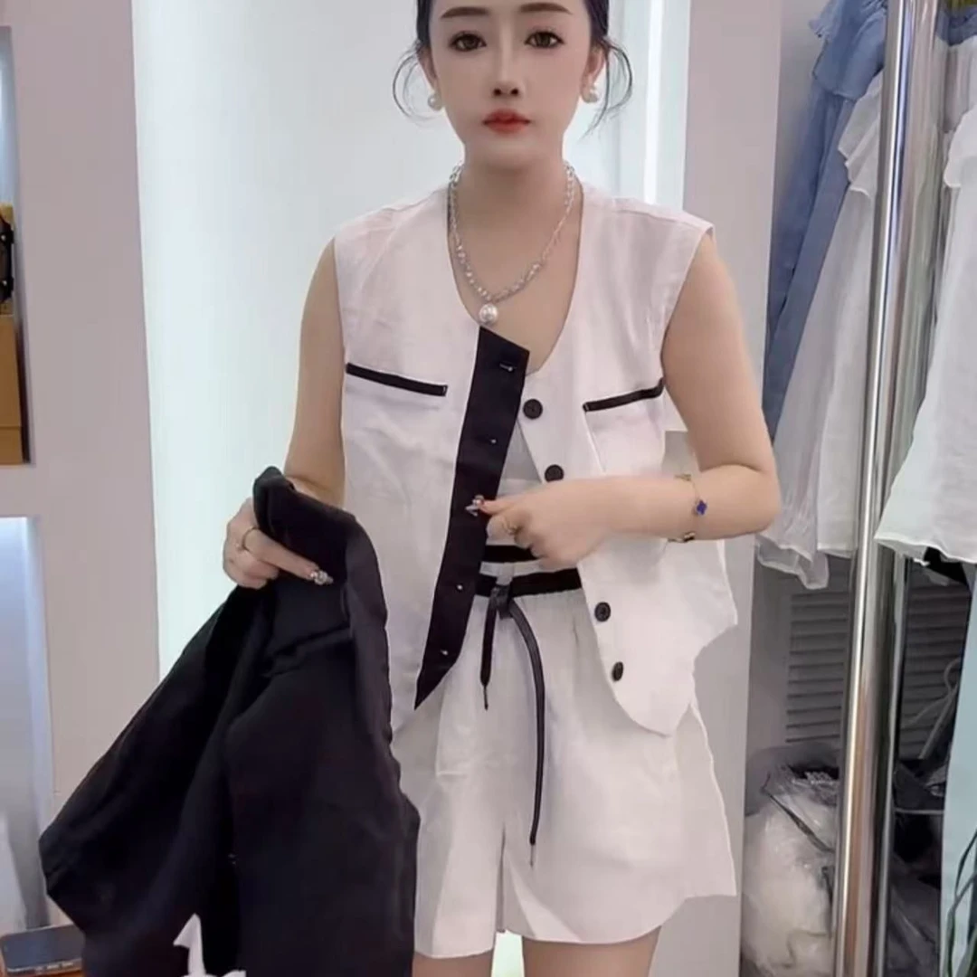 减龄高级感小香风气质蝴蝶结白色上衣马甲阔腿短裤套装女显瘦洋气