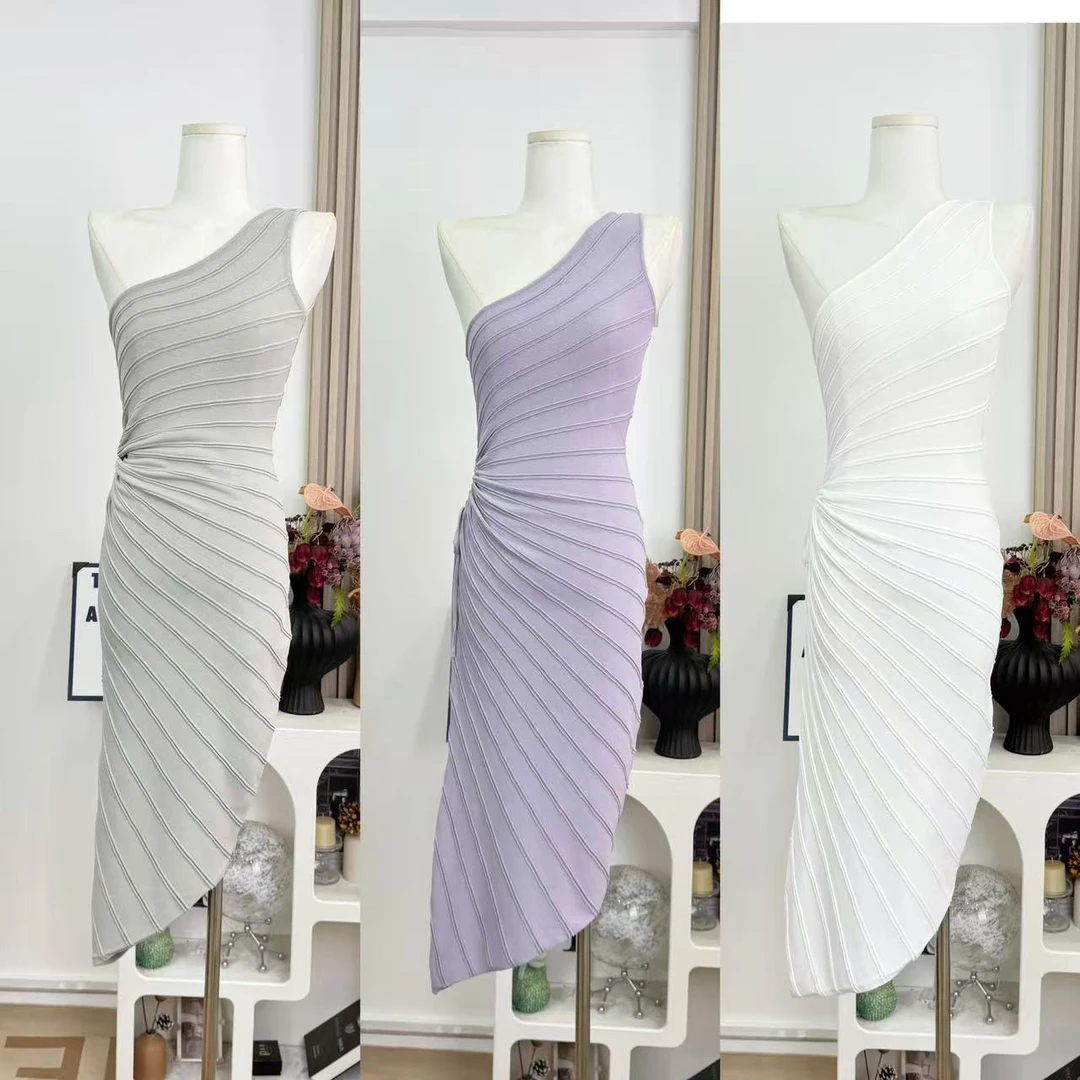 法式优雅气质白色斜肩针织连衣裙女夏季性感镂空收腰显瘦包臀裙