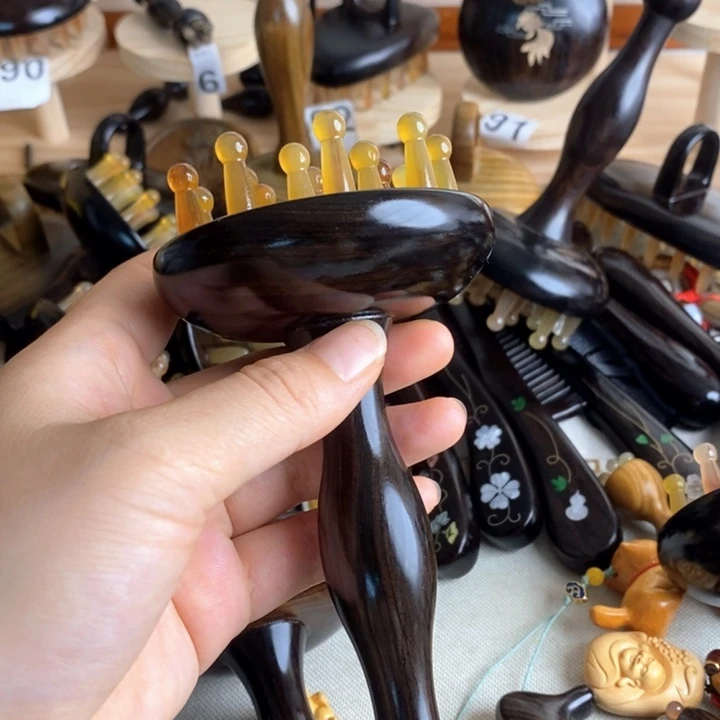 紫光檀按摩梳子按摩