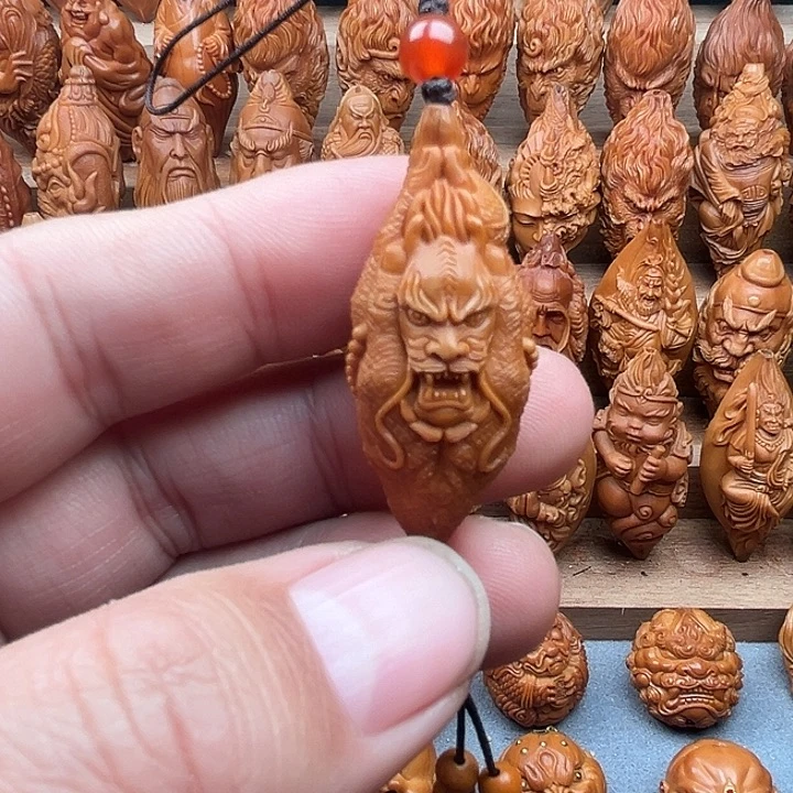 橄榄核吊坠19龙佛手