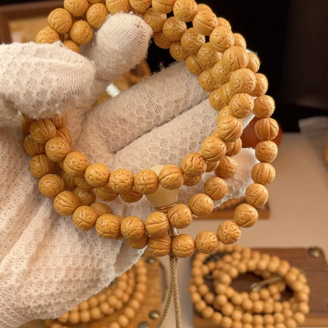 这***叔吊坠桃核桃核手持黄金豆