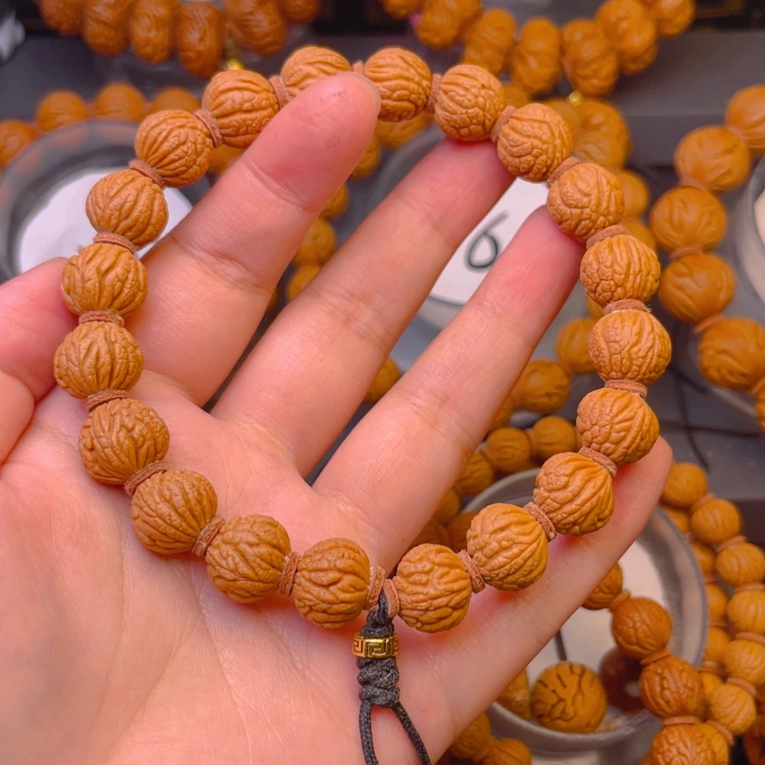 吴***海吊坠桃核耶耶耶耶