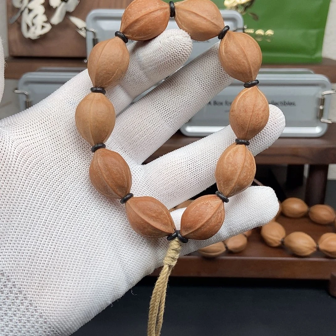 橄榄核手串1725放漏一条三花小籽