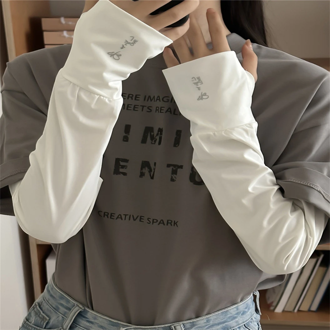 宽松冰袖女夏季薄款透气户外骑行开车防紫外线遮阳护手臂防晒袖套