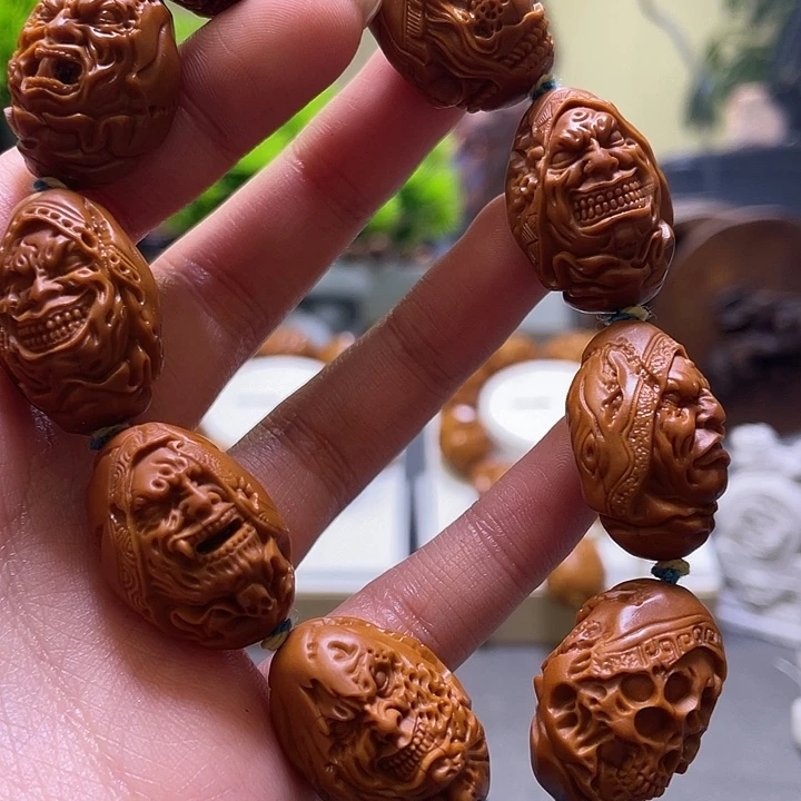 阿***）橄榄核吊坠橄榄核雕