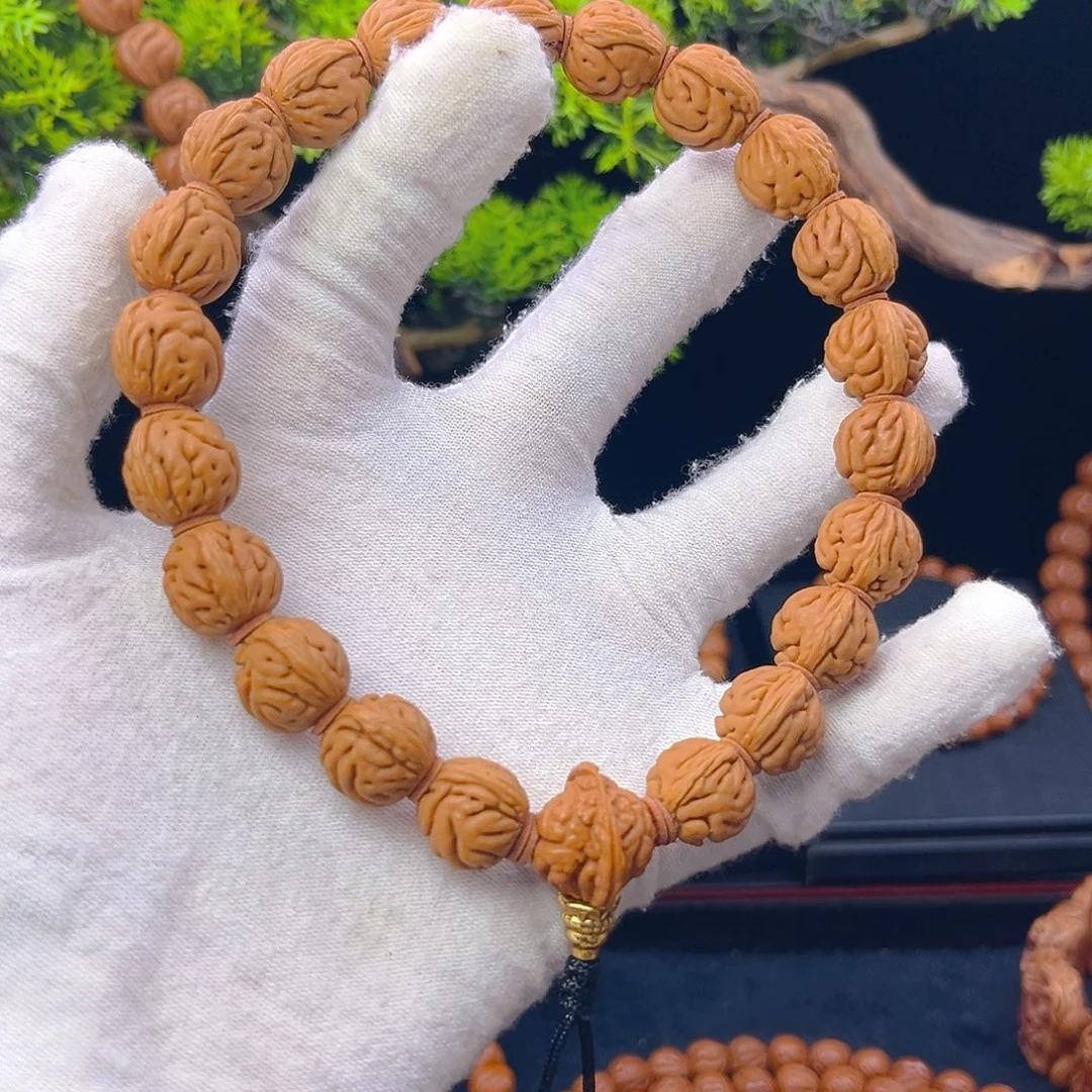 ღ***:吊坠桃核野生桃核