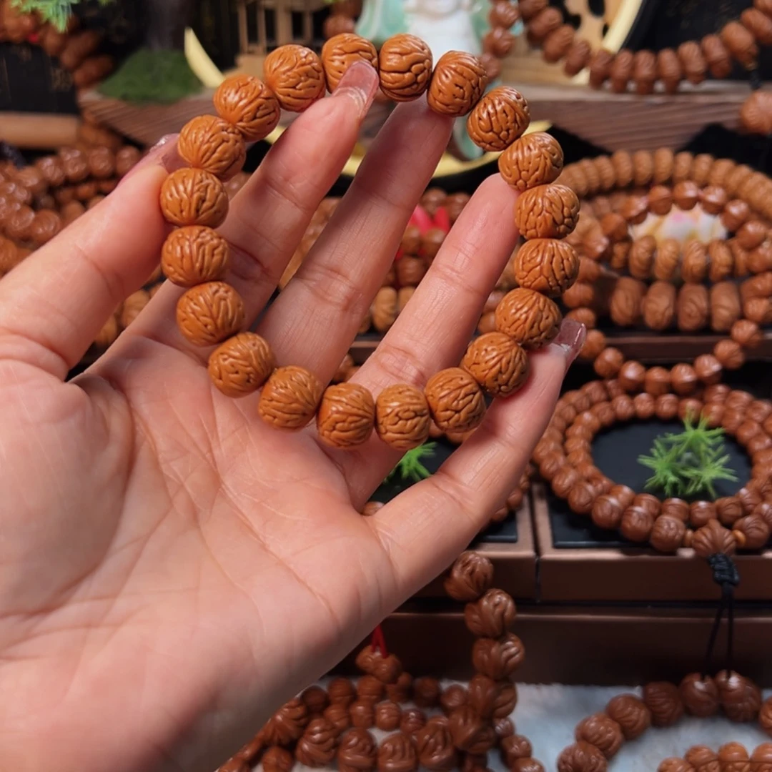 桃核手串14野生龙纹凤羽单圈