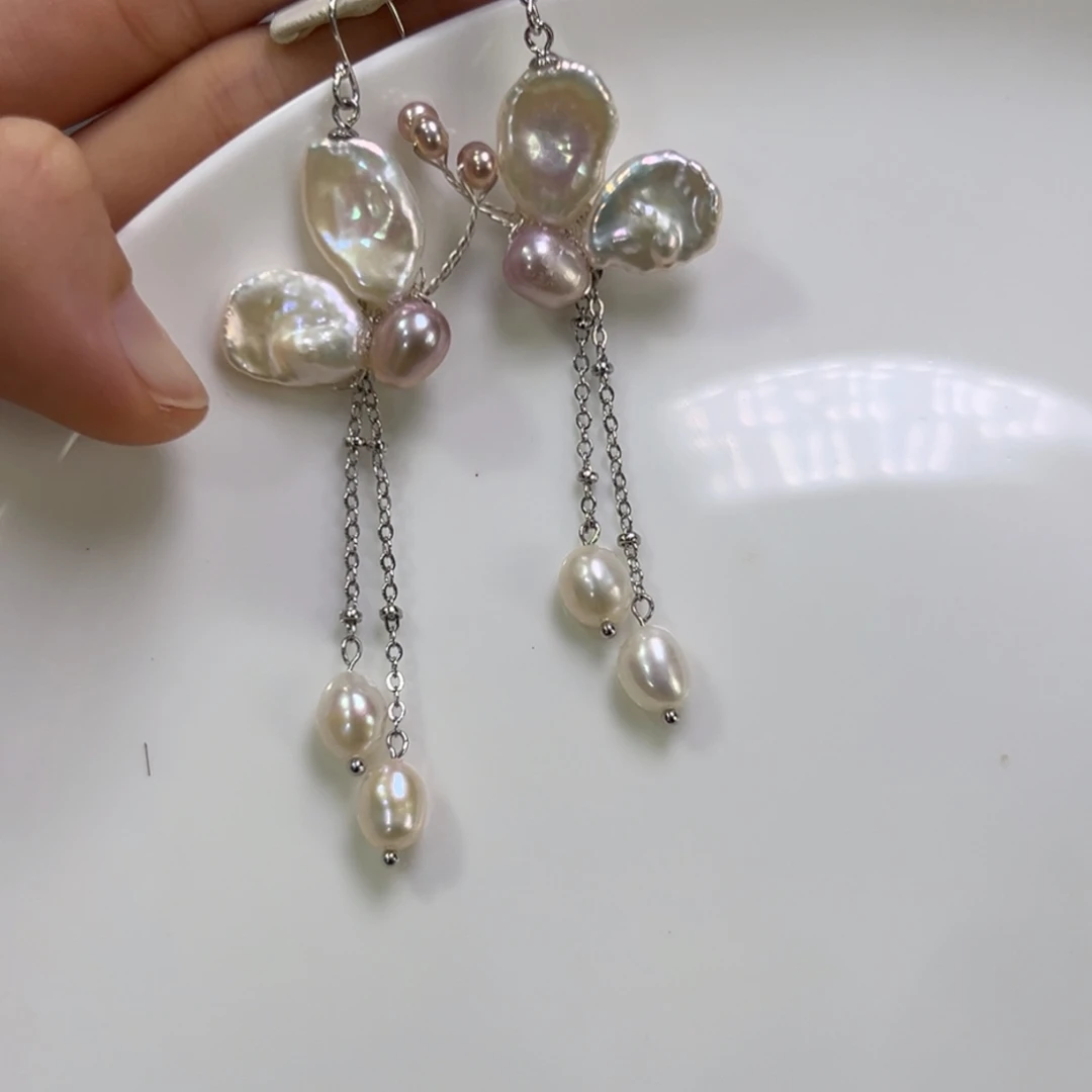 非金属白色蝴蝶耳钩一对