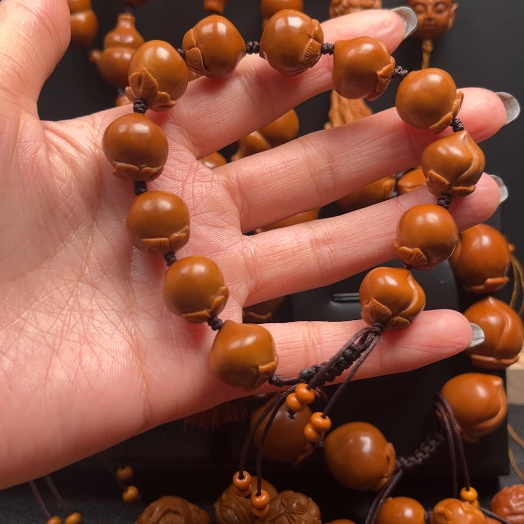 伊****手串橄榄核寿桃14