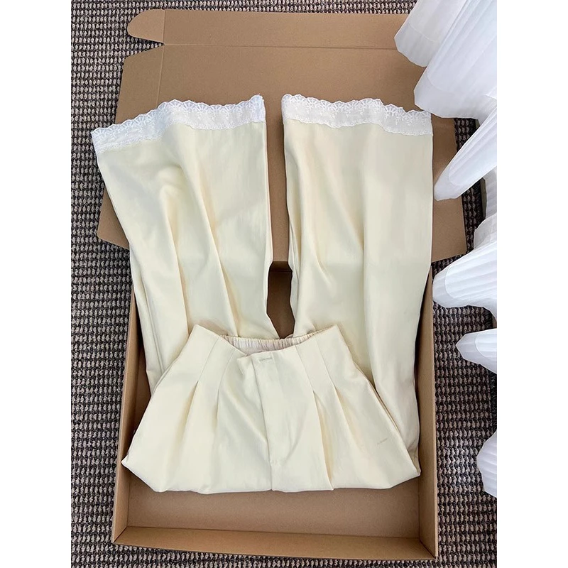 夏季2025新款奶黄色蕾丝拼接长裤女设计感直筒阔腿休闲垂感拖地裤