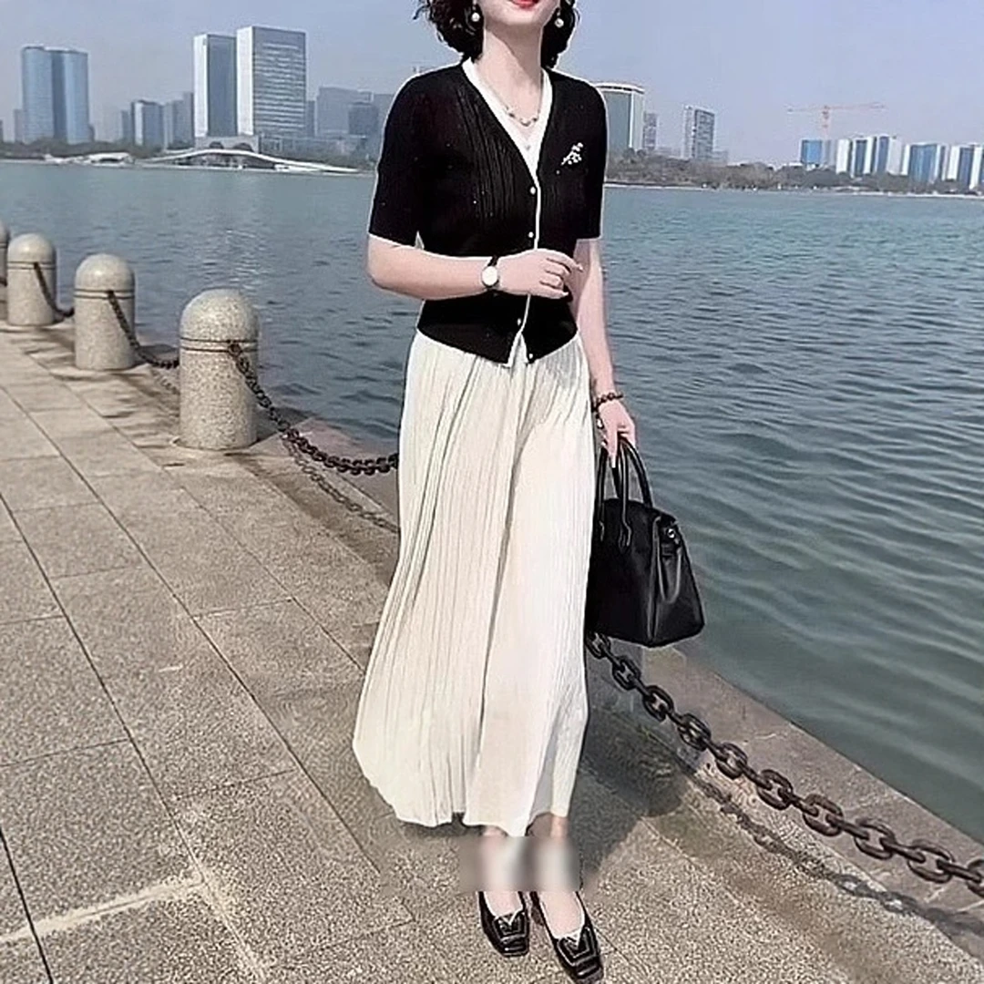 半身裙女2025白色高腰显瘦气质百搭a字裙中长款大摆伞裙百褶