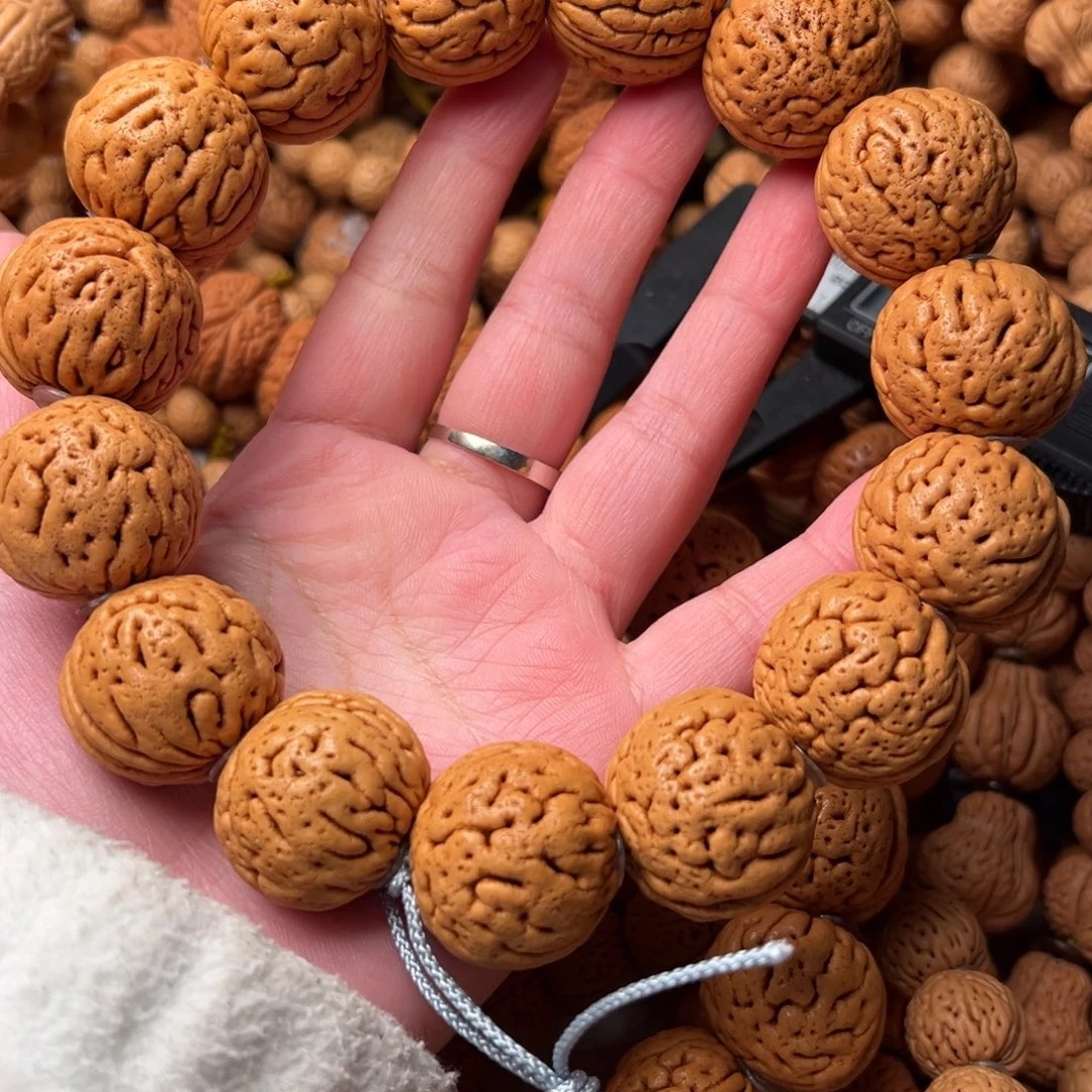 25尺寸大个桃核手持