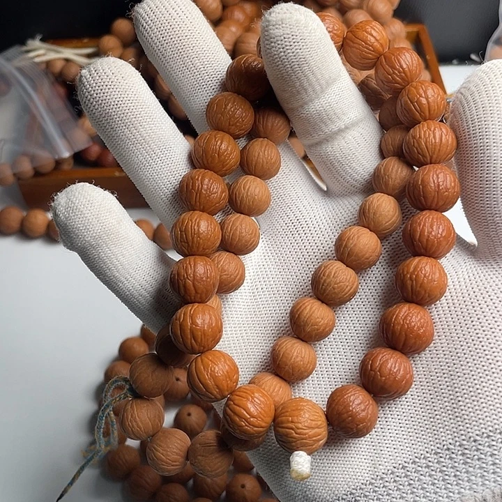 0***e猴头核桃手串纯天然无修凤羽