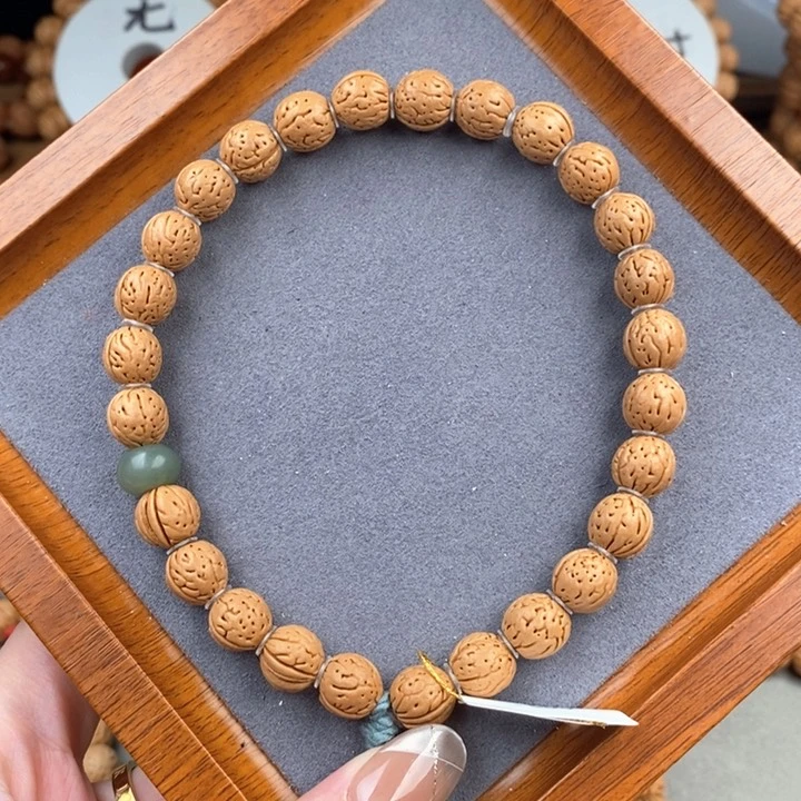 桃核手串宽脐小金豆9.5-1……