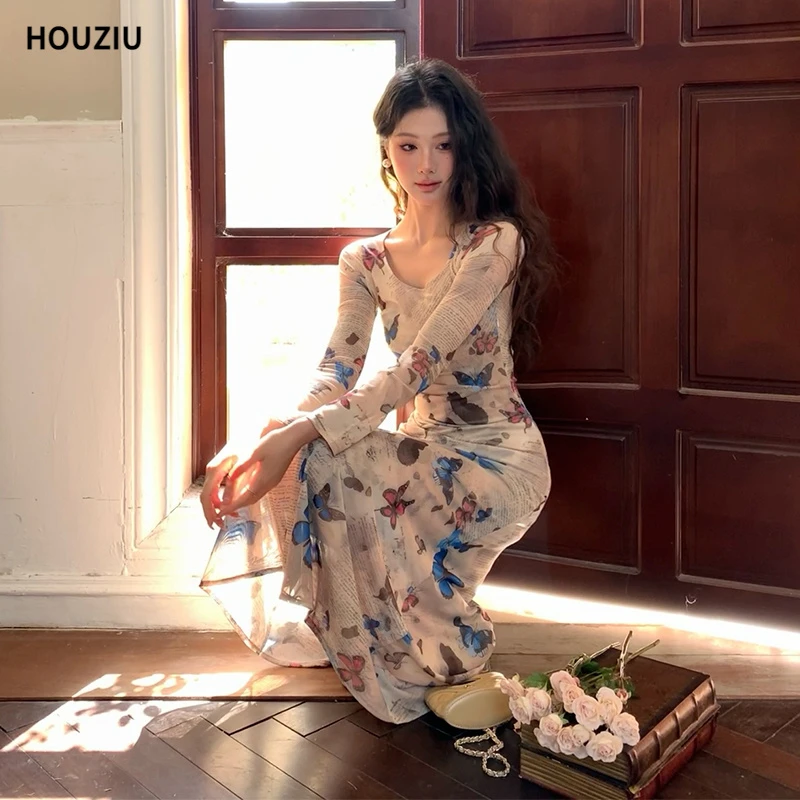 欧若风海边度假蝴蝶印花连衣裙长袖2025新款抽褶修身显瘦网纱长裙