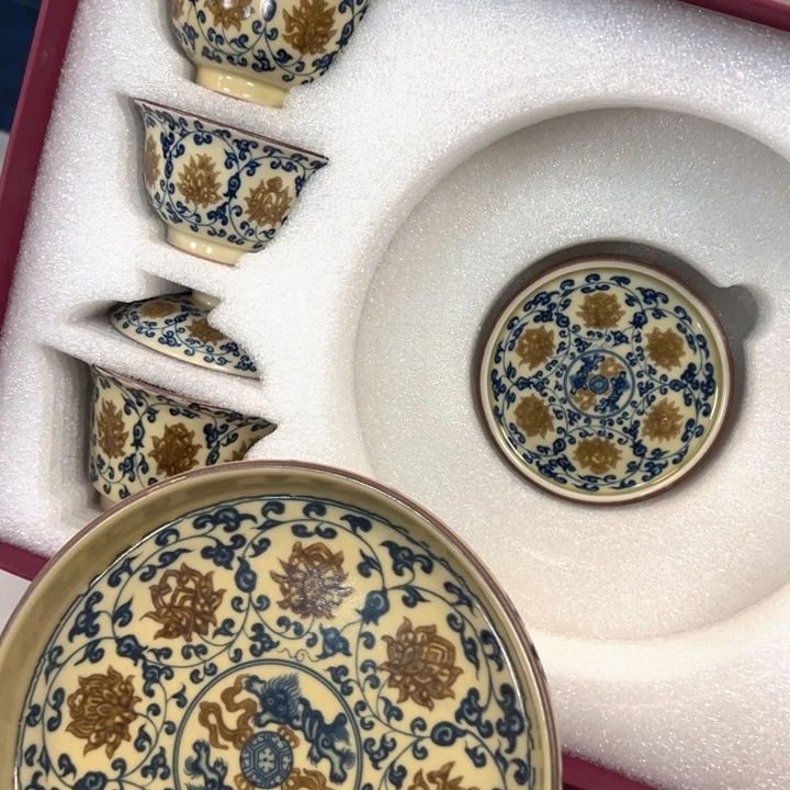 S***`瓷片釉里金缠枝莲五件套