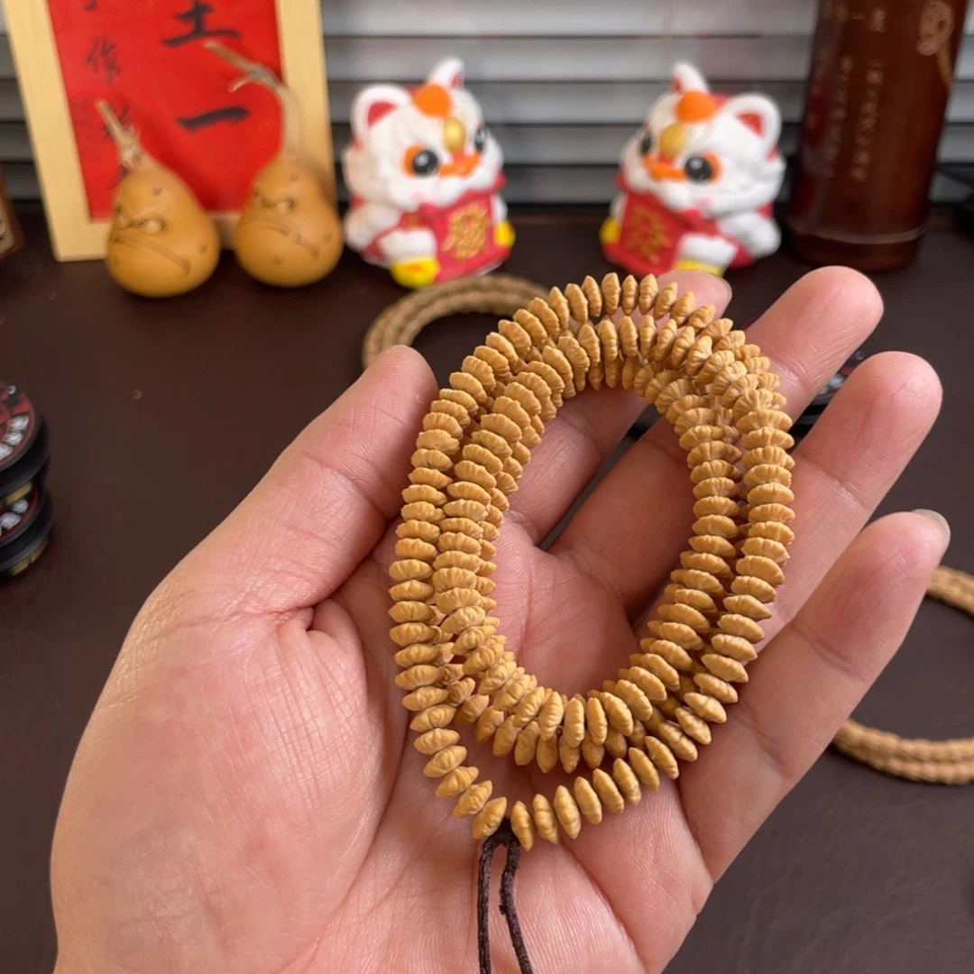 柏香籽/百香籽吊坠东****葛捡漏 金叶莲花 金碟