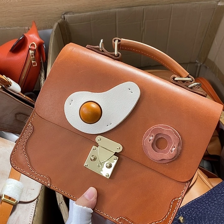 黄牛皮瑕疵单肩包手提