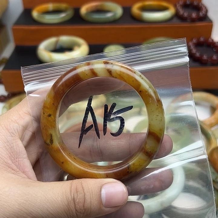 跳***跳蛇纹石玉合金手镯