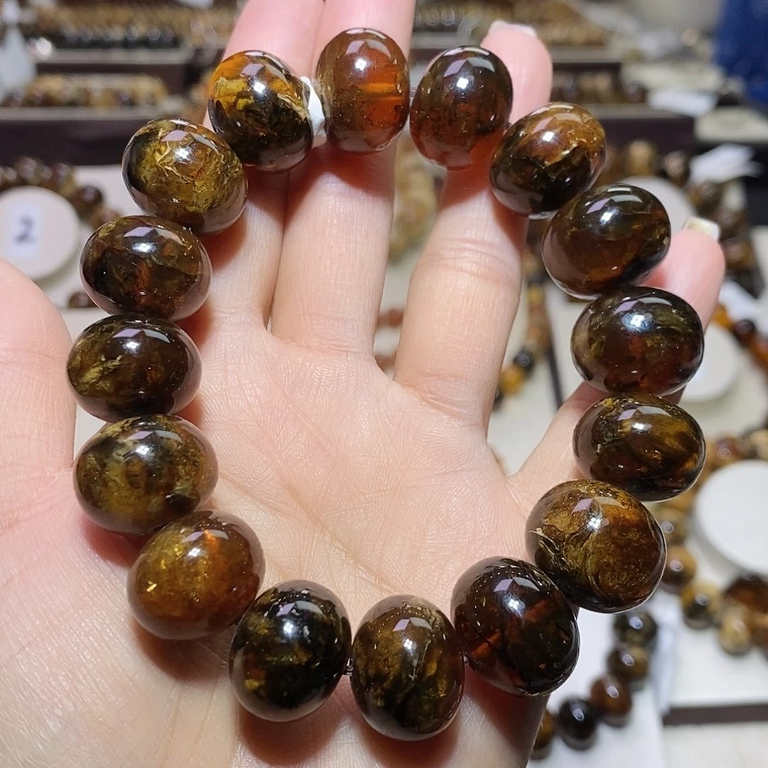 妙***祥琥珀未镶嵌裸石蜡花17+