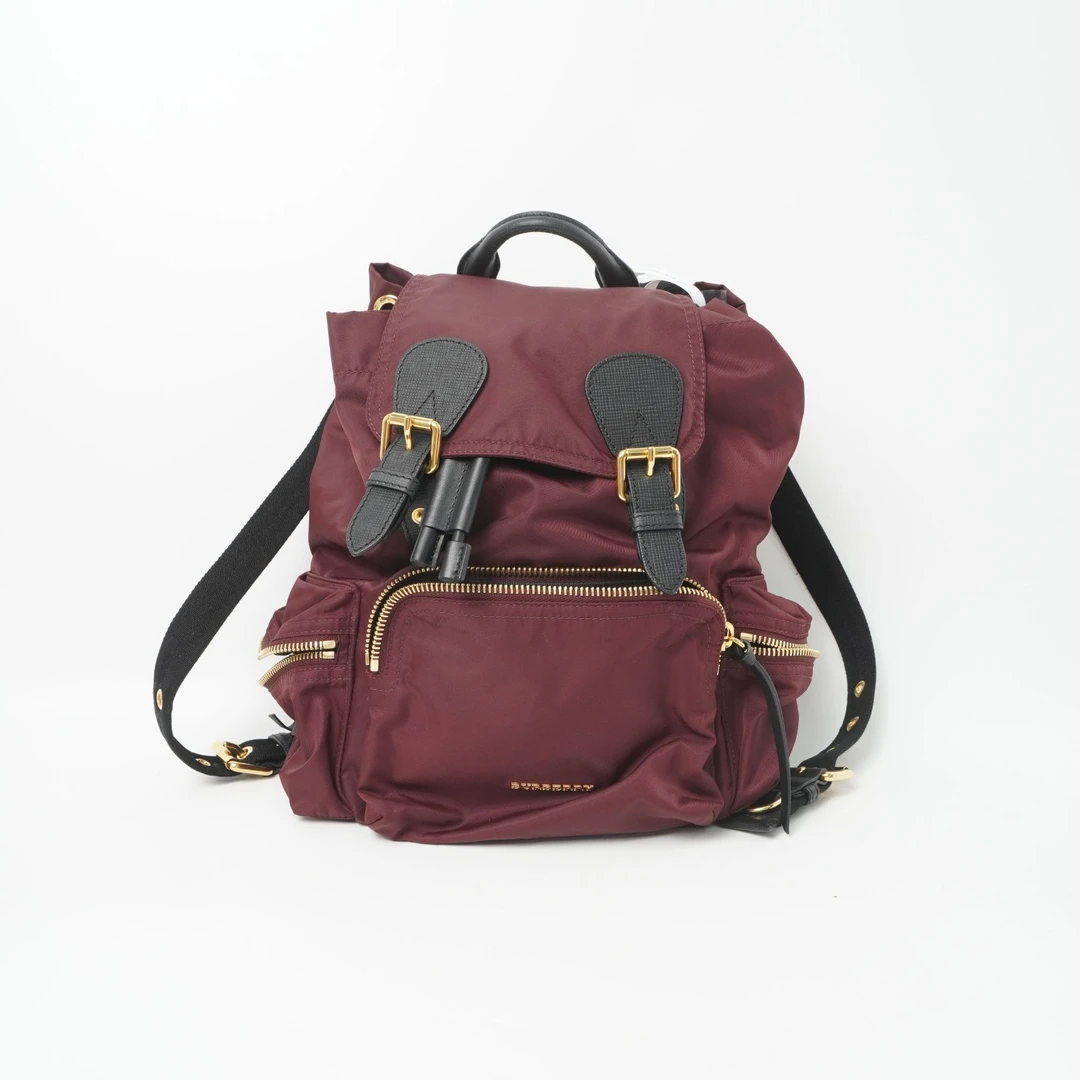 95新 BURBERRY/博柏利 博柏利双肩包酒红色帆布/DS015584