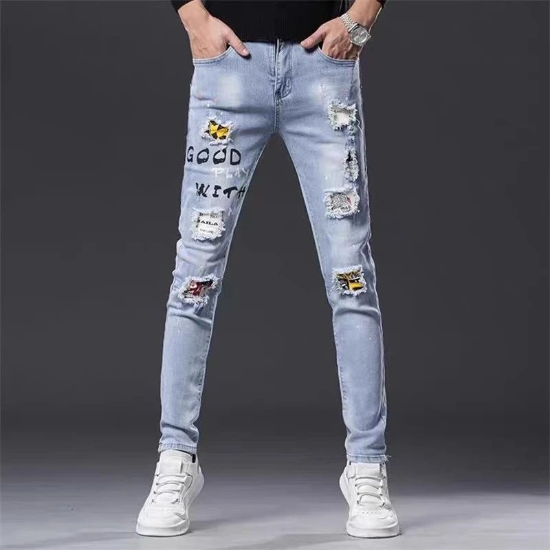 浅蓝色个性破洞补丁牛仔裤男士潮牌夏季薄款潮流修身小脚弹力裤子