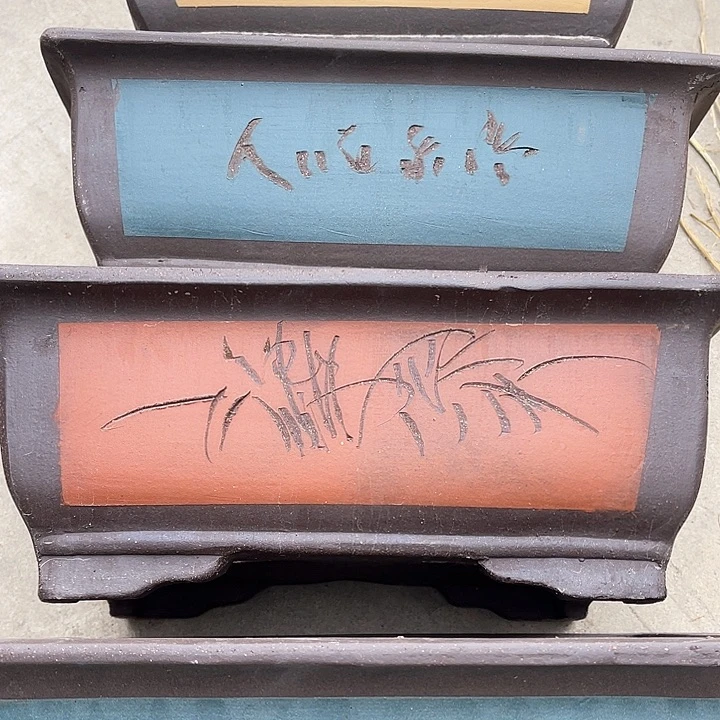 紫砂花盆100-4。