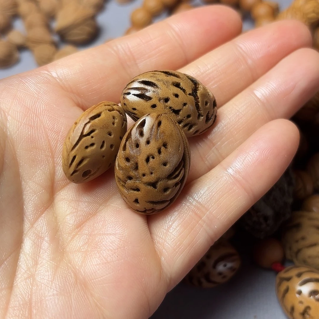 桃核吊坠秦岭龙文桃硝3颗打磨好