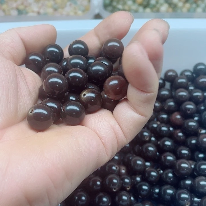 小****吊坠白玉菩提13.7黑金圆100颗