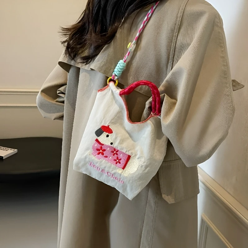 日系刺绣可爱腊肠狗水桶包女2025新款手机包百搭通勤单肩斜挎包LQ