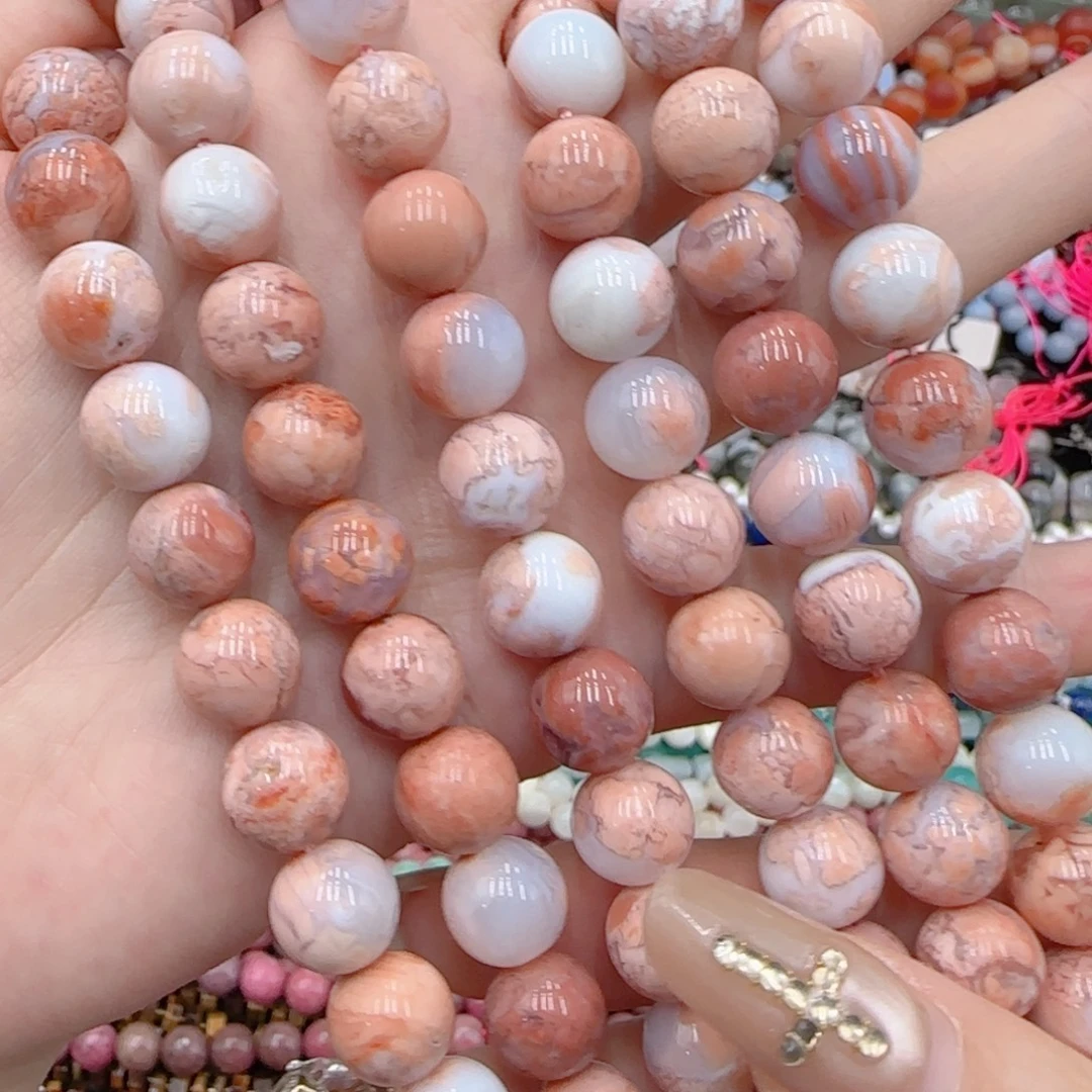 玛瑙/玉髓未镶嵌珠宝半成品原矿粉樱花一条卡十