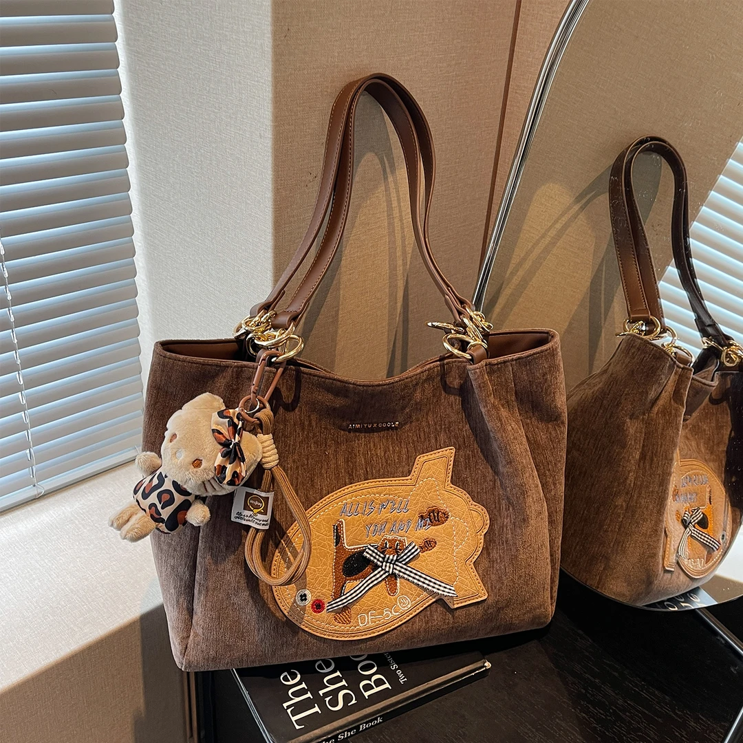 艾米兔 X COOLE女包2025新款简约通勤大容量休闲复古单肩托特包