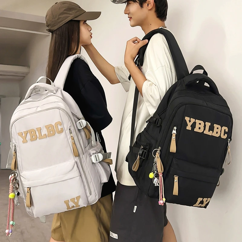 潮流时尚背包新款双肩包男女休闲大容量书包初中高中大学生旅行包