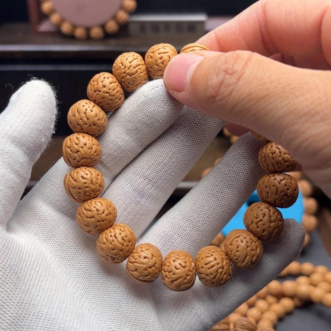 爱***面手串桃核金丹桃核