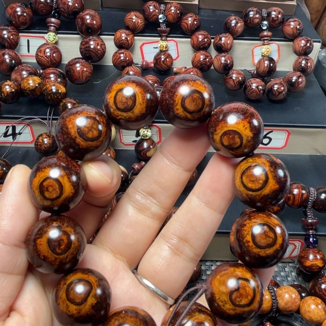 伊***源黄花梨/降香黄檀2.0双面天眼