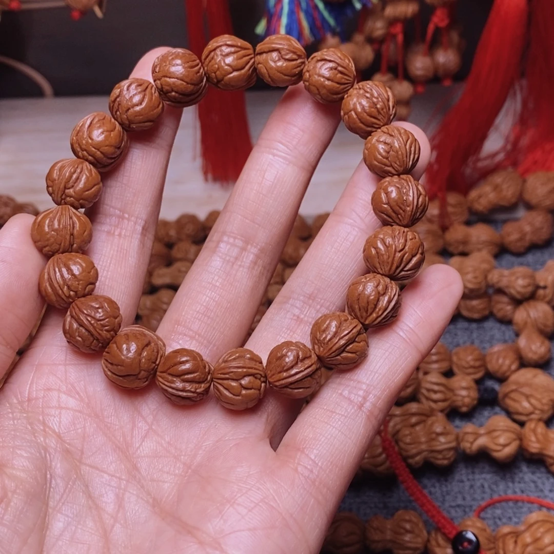 吊坠桃核桃枭手串