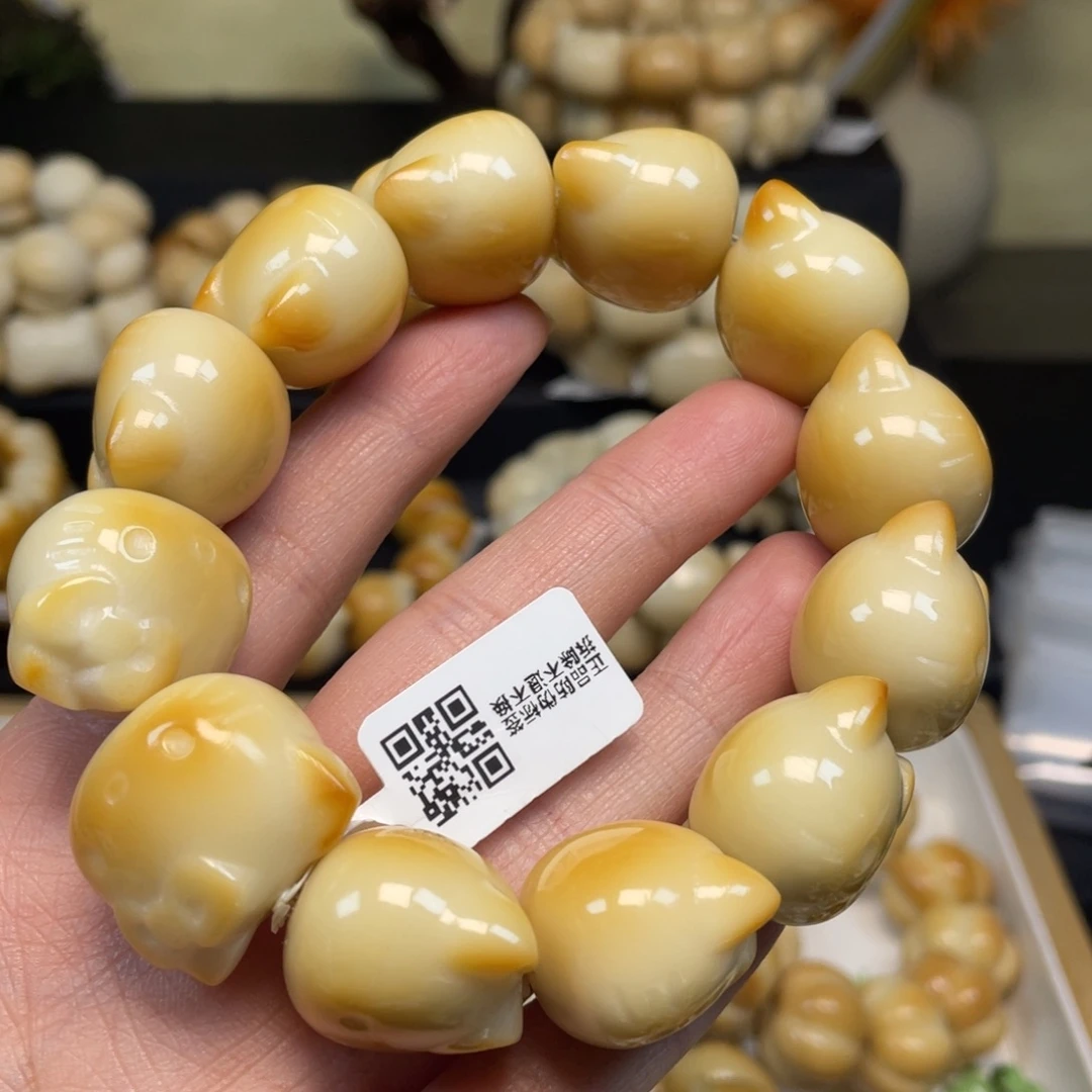 菩提根/象牙果手串102kt猫头微瑕