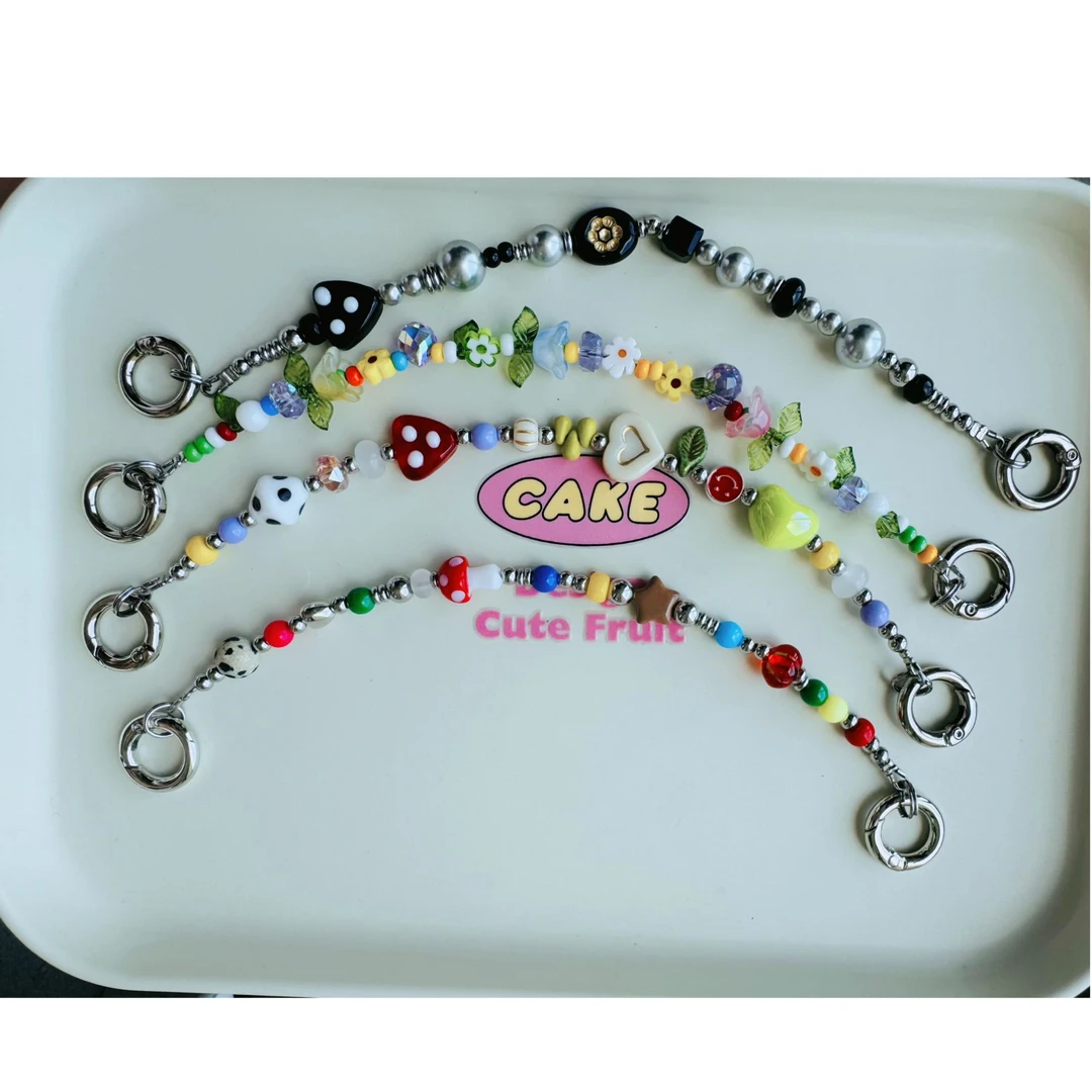 原创设计潮牌手机壳双耳挂链短款手提链防丢包包挂链