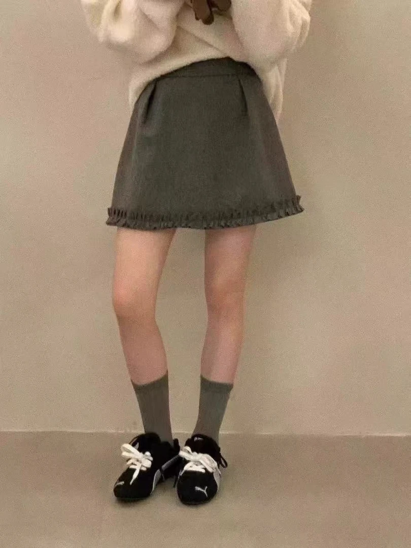 UU韩系简约秋冬新款设计感花苞毛呢半身裙显瘦A字短裙女