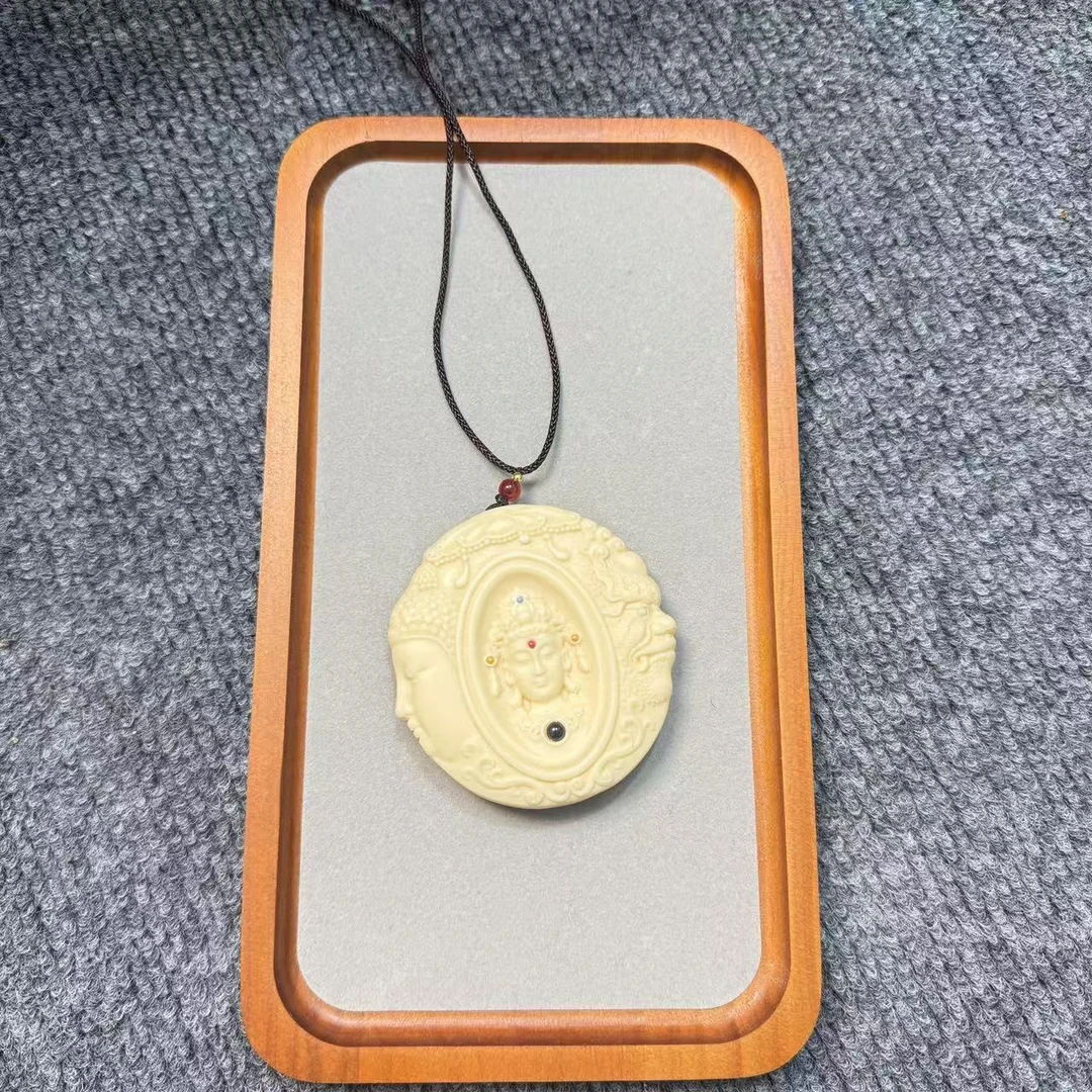 工艺品猛犸牙观音牌子