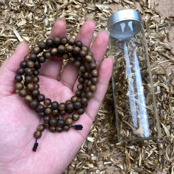 沉香原材料7mm多圈20克+沉水浮海南莺歌绿奇楠乌身圆叶