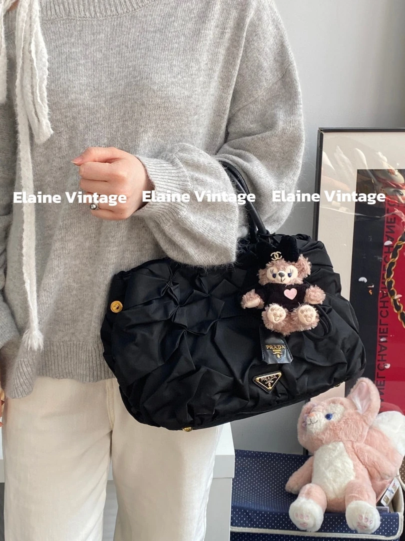 95新 Prada/普拉达 黑银褶皱手提包(27cm)