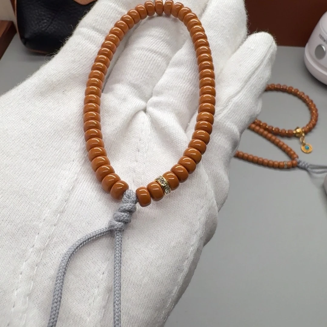 ****。手串橄榄核微白5.9小豆丁