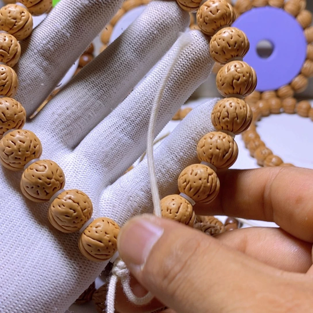 o***。桃核手串野生盘锦核王